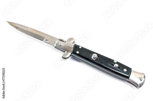 Switchblade knife isolated on white