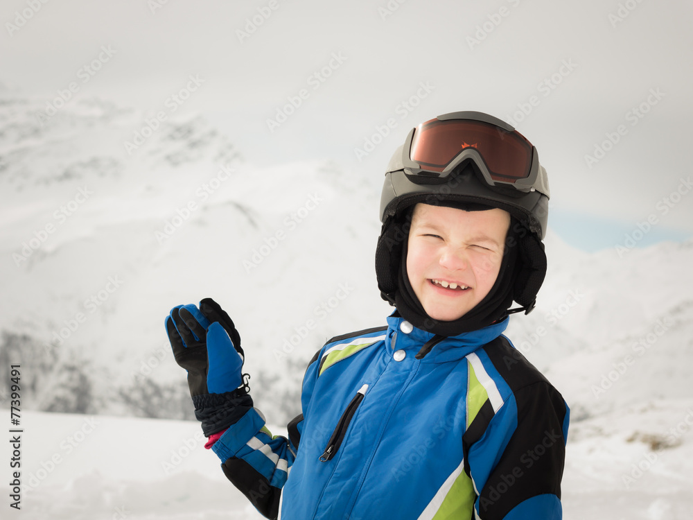 Happy young skier on winter background