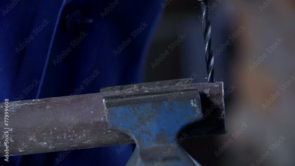 Detail shot of drilling into metal object Detail shot of drilling into metal object