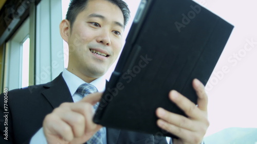 Wallpaper Mural Male Asian Chinese Business Advisor Wireless Tablet  Torontodigital.ca