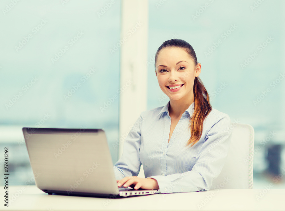 businesswoman with laptop in office businesswoman with laptop in office