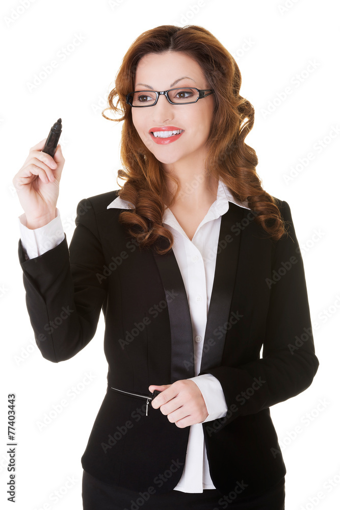 Businesswoman writing with pen on abstract screen. Businesswoman writing with pen on abstract screen.