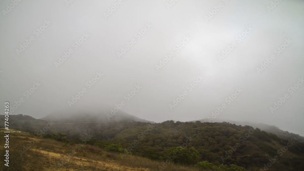Time lapse of clouds rolling over green hills Time lapse of clouds rolling over green hills
