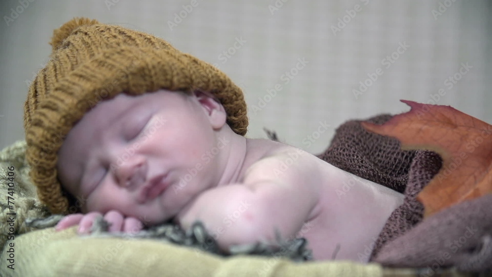 Baby boy resting with a cap Baby boy resting with a cap