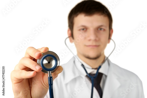 Male doctor working with stethoscope