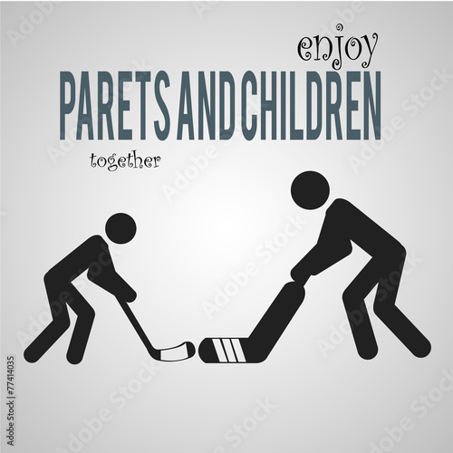 father and son playing hockey over gray color background