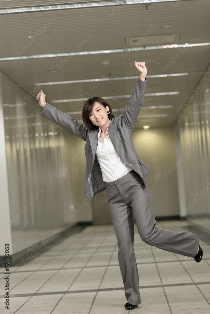 Fototapeta premium Cheerful and exciting business woman