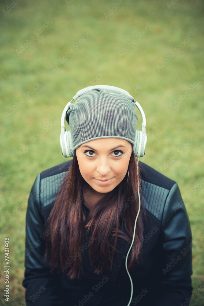 young beautiful brunette straight hair woman in the park young beautiful brunette straight hair woman in the park