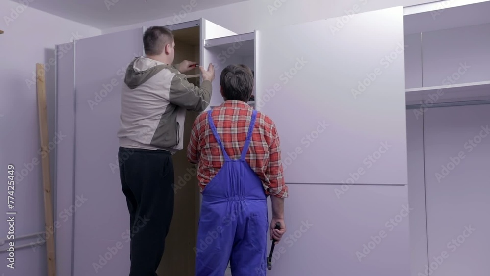 Inserting the shelfs into the closets Inserting the shelfs into the closets