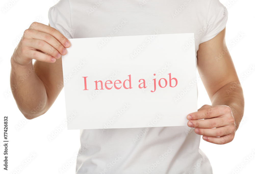 Sheet of paper with inscription I need a job in male hands Sheet of paper with inscription I need a job in male hands