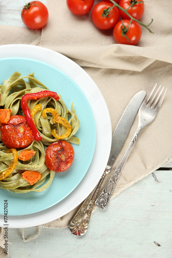 Tasty pasta with pepper, carrot and tomatoes Tasty pasta with pepper, carrot and tomatoes