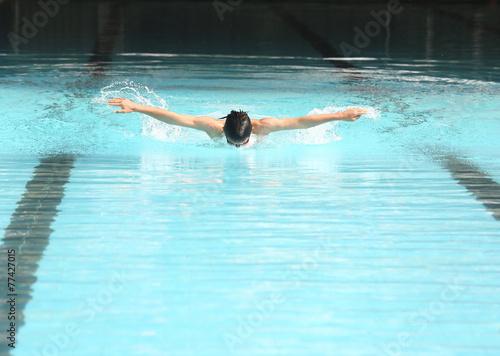 Butterfly stroke swimming sport practice for competition