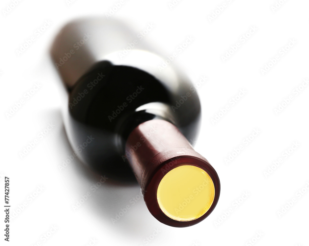 Lying red wine bottle, isolated on white Lying red wine bottle, isolated on white