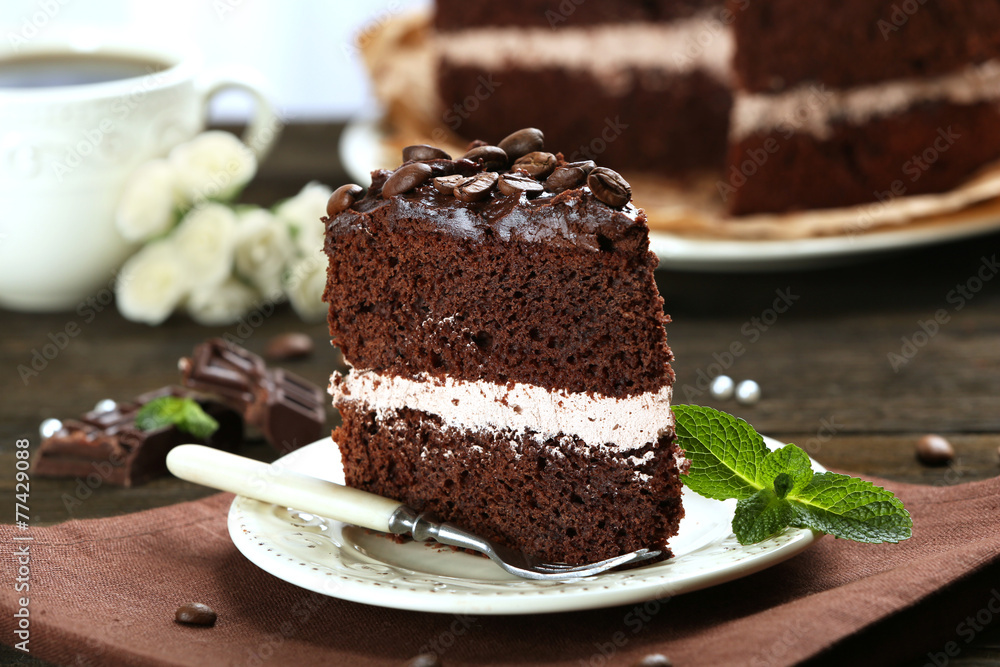 Delicious chocolate cake on table close-up Delicious chocolate cake on table close-up