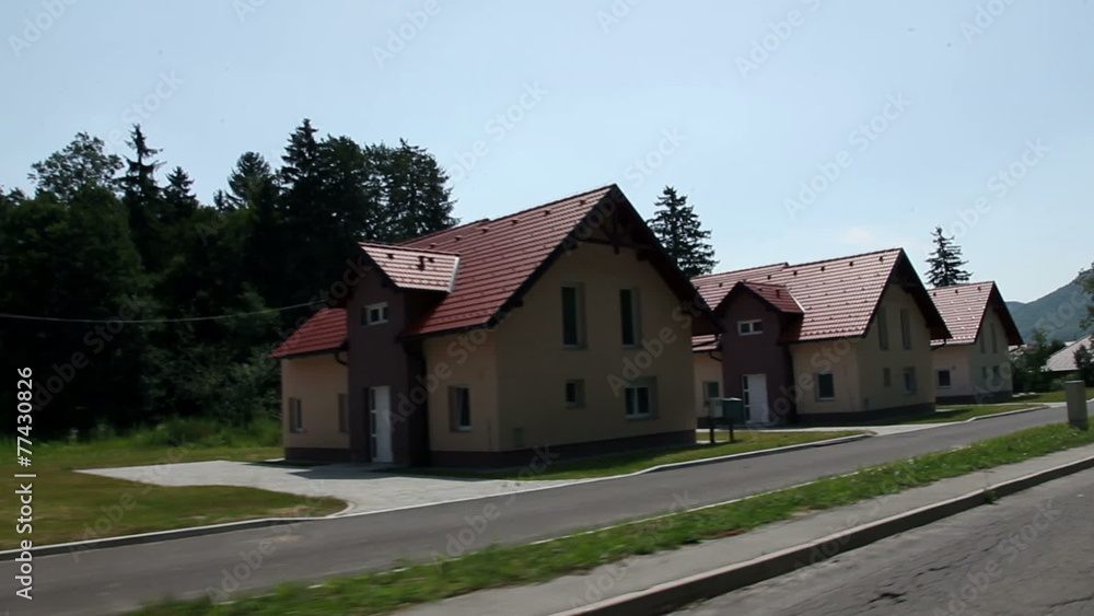 Passing by twin houses in outskirt of town Passing by twin houses in outskirt of town