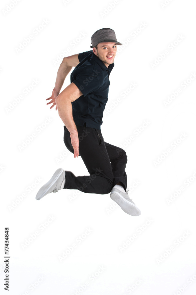 young dancer jumping on white background in studio.