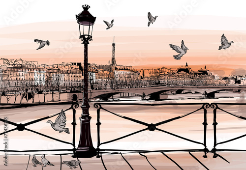 Sunset on Seine river from Pont des arts in Paris
