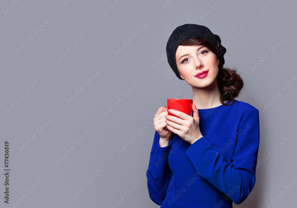 women in blue dress with red cup women in blue dress with red cup