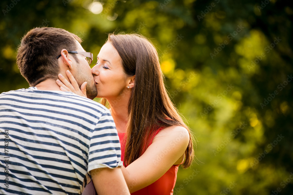 Young couple kissing Young couple kissing