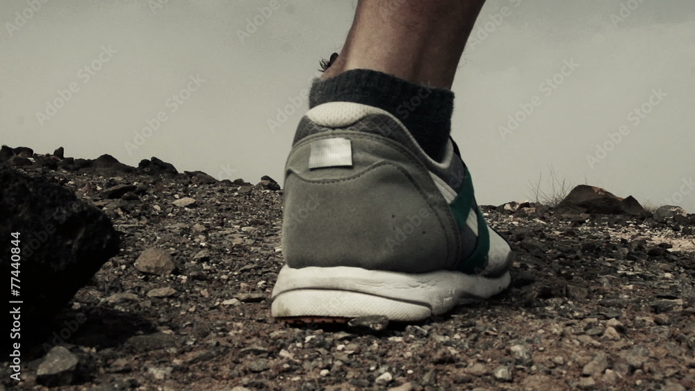 Young people jogging on desert, slow motion shot at 240fps Young people jogging on desert, slow motion shot at 240fps