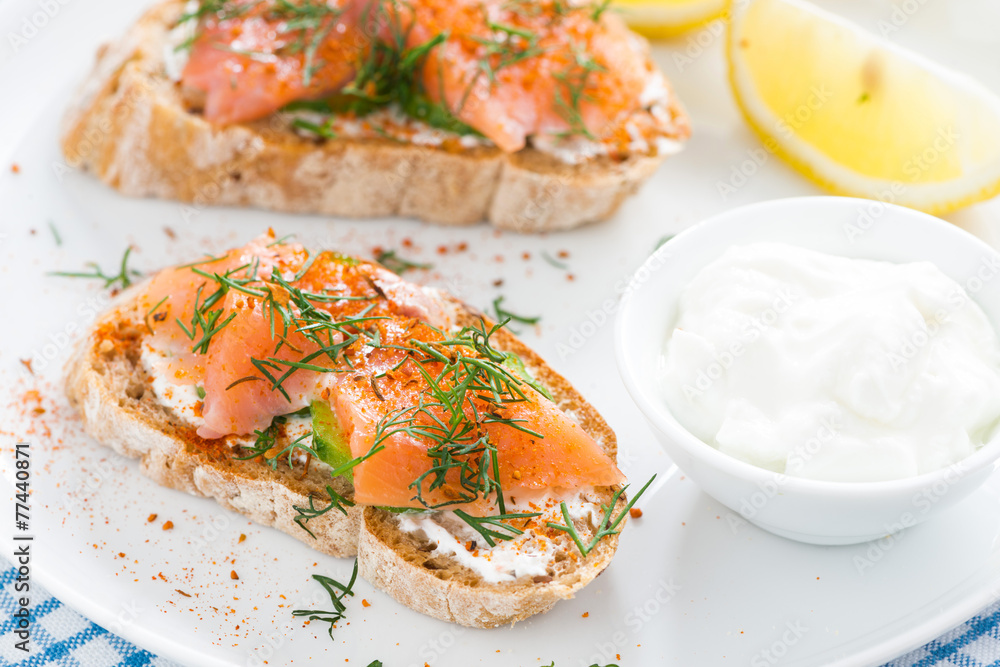 delicious appetizer with bread, salted salmon and cream cheese