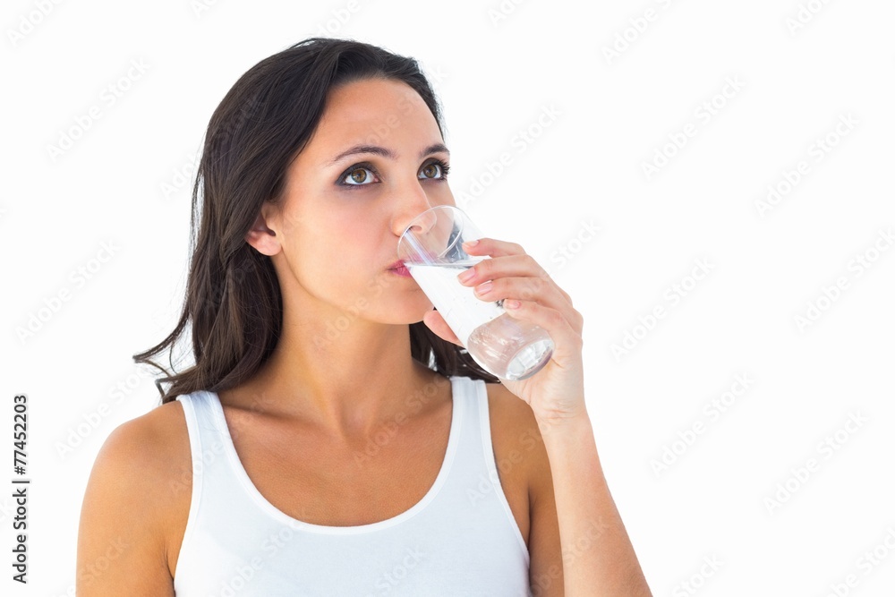 Pretty brunette drinking glass of water Pretty brunette drinking glass of water