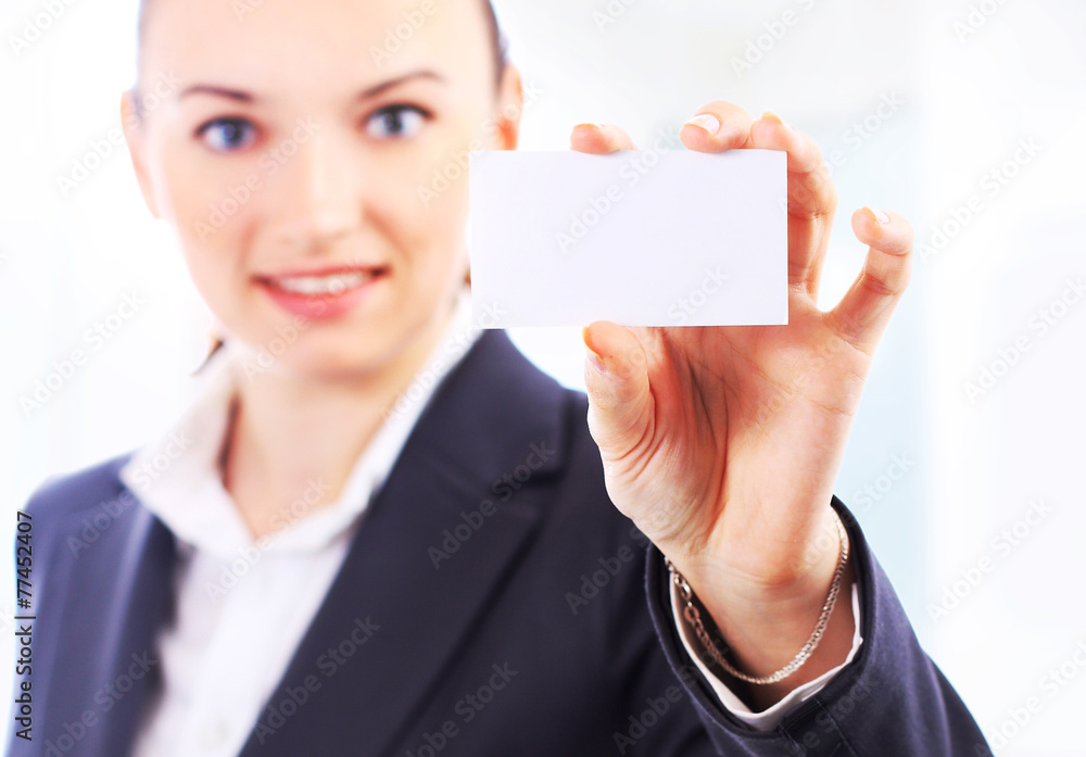 Beautiful businesswoman with the business card Beautiful businesswoman with the business card