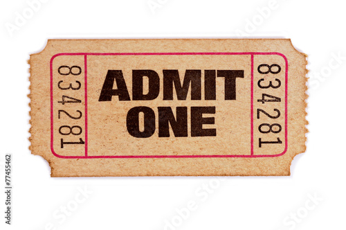 Old faded stained and damaged admit one movie or concert admission ticket stub isolated white background