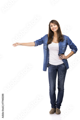 Beautiful woman standing over a white background 