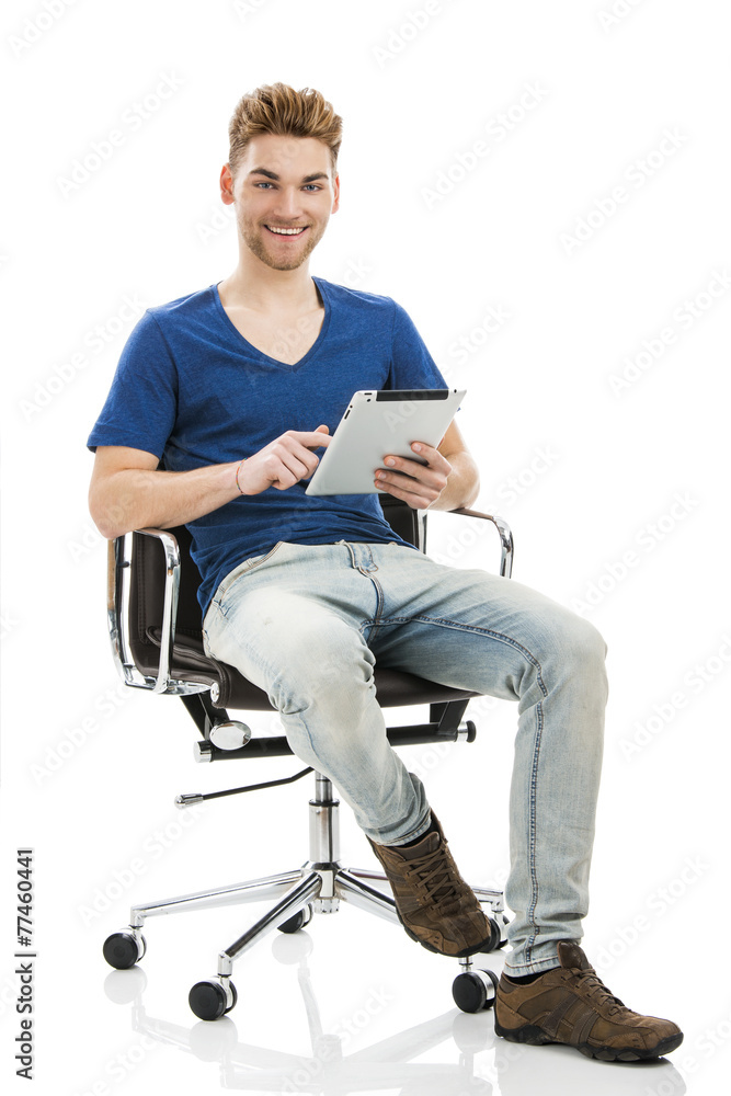Young man working with a tablet Young man working with a tablet