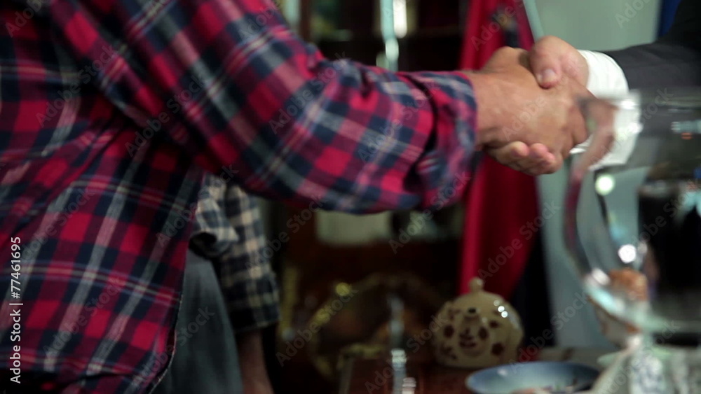 Peasant shaking hands with the mayor