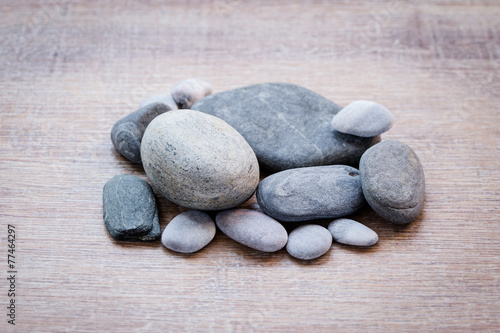 Stones decoration on the brown table.