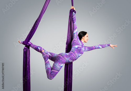 Beautiful dancer on aerial silk, aerial contortion, aerial ribbo