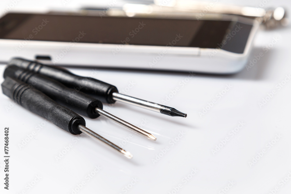 Smartphone and screwdrivers Smartphone and screwdrivers