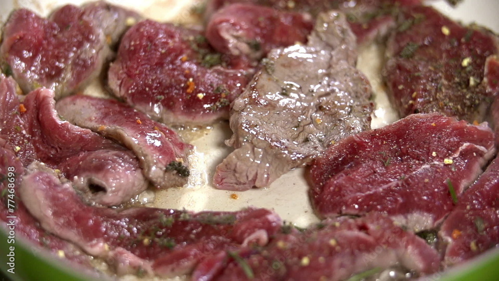 Frying the pieces of meat Frying the pieces of meat