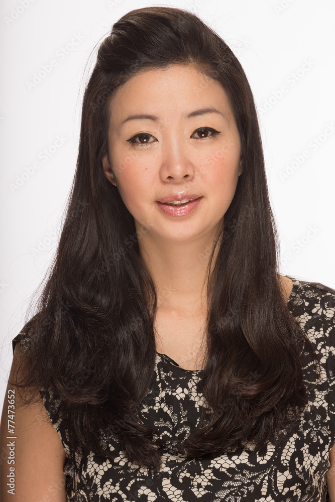 Young Asian woman calm smile face portrait Young Asian woman calm smile face portrait