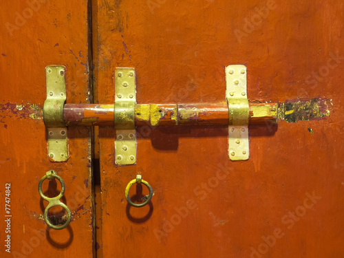 Old door locking in Thai temple