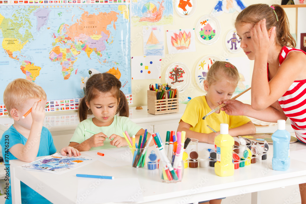 Fototapeta premium Children draw in the classroom