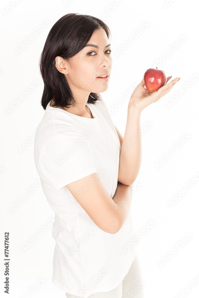 Smiling woman with apple isolated on white Smiling woman with apple isolated on white
