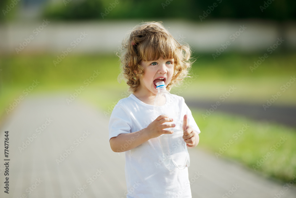 little girl drinking clean water from plastic bottle little girl drinking clean water from plastic bottle