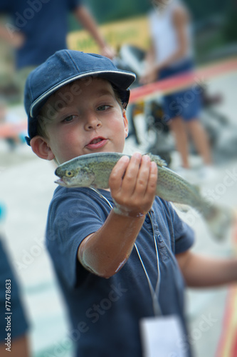 happy child with a trout