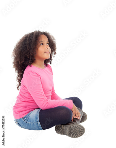 Wallpaper Mural Adorable african little girl sitting on the floor Torontodigital.ca