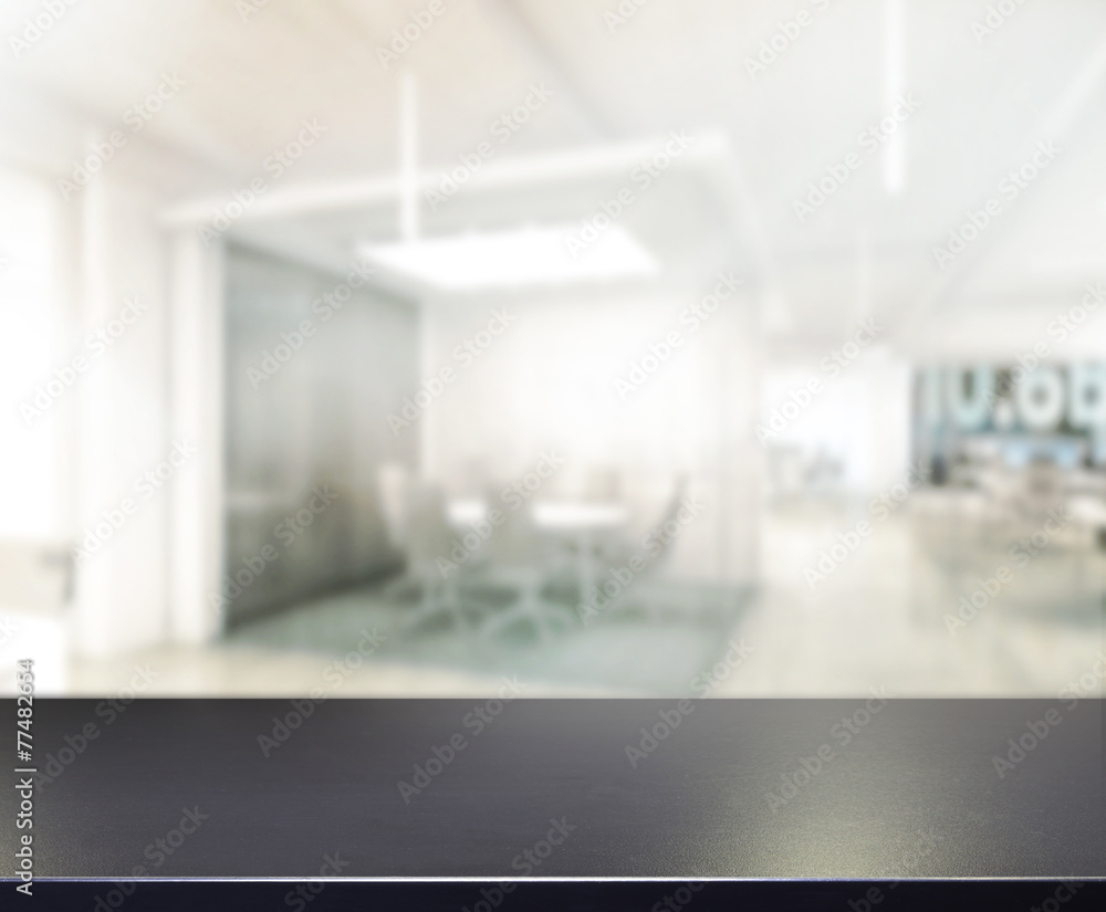 Fototapeta premium Table Top And Blur Office Background
