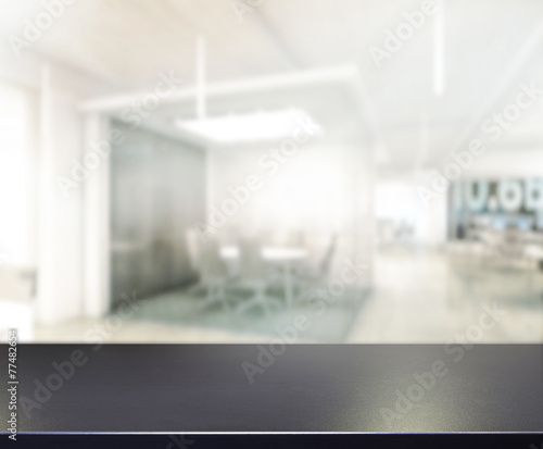 Table Top And Blur Office Background