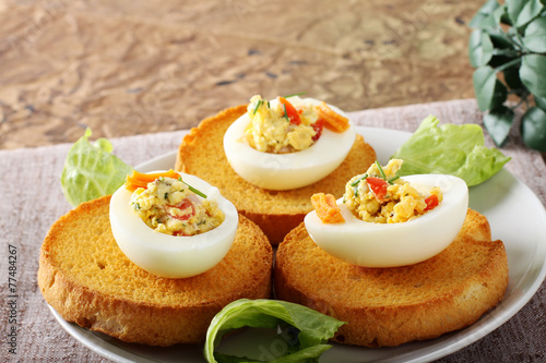 Egg stuffed with pepper  chives  mayonnaise