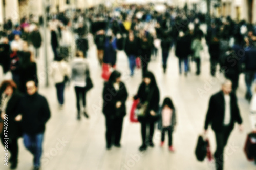 defocused blur background of people walking © nito