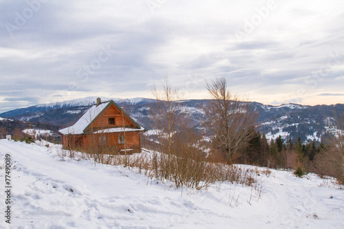 Mountain cottage  in winter.  Silesian Beskids Mountains, Poland © krysek