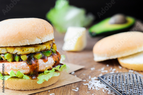 Wallpaper Mural Homemade fish burger with salmon, avocado and pineapple.Close up Torontodigital.ca