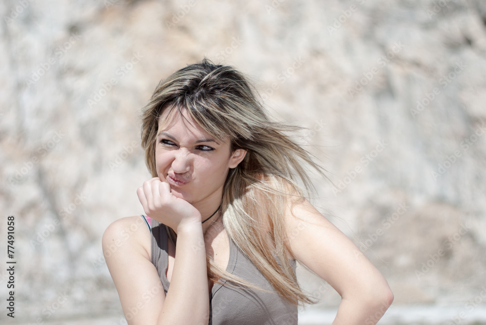 Blonde lady do a grimace Blonde lady do a grimace