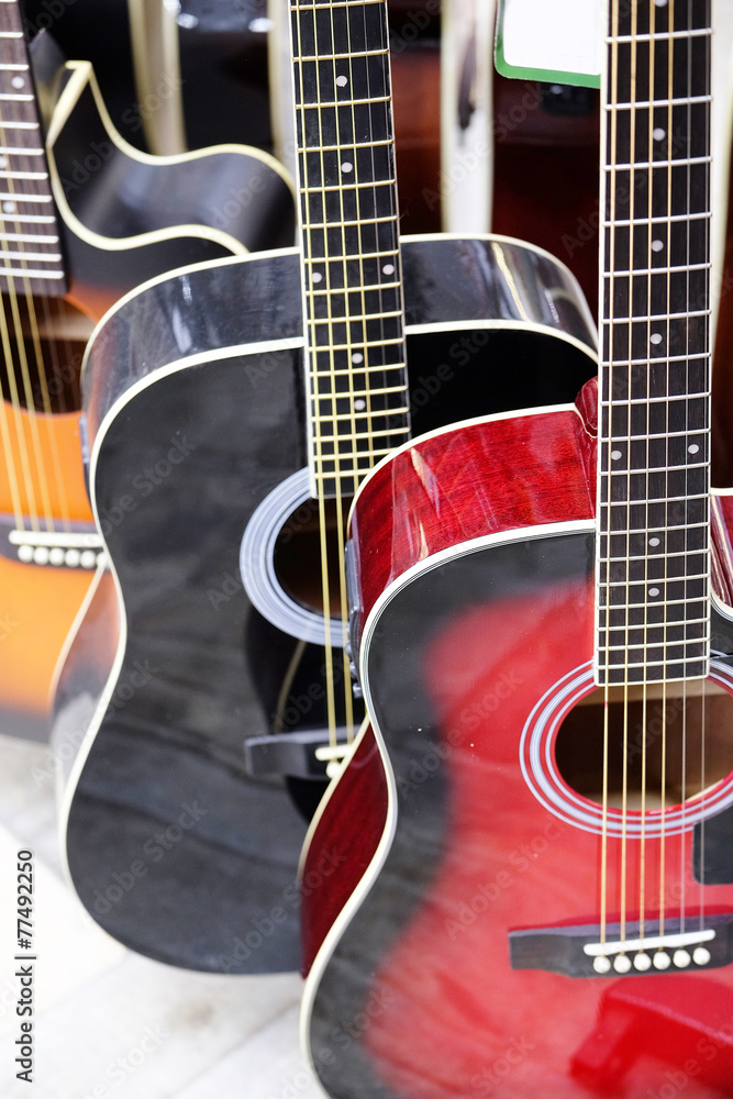 Fototapeta premium Guitars in the store background